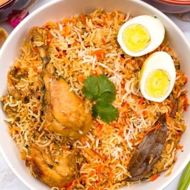 Hyderabad Chicken  Dum Biryani Tray.